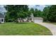 Well-maintained single-Gathering home with a neat lawn, driveway, and an attached garage enhancing its curb appeal at 1028 Pocono Pl, Newton, NC 28658