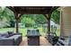 Relaxing patio with fire pit and comfortable outdoor seating nestled in backyard at 1028 Pocono Pl, Newton, NC 28658
