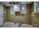 Unfinished basement area with potential for customization and additional storage space at 1036 20Th Ne St, Hickory, NC 28601