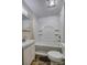 Bathroom with white fixtures including a sink, toilet, and shower-tub combo at 1036 20Th Ne St, Hickory, NC 28601