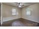 Cozy bedroom offering neutral walls, wood floors, and natural lighting at 1036 20Th Ne St, Hickory, NC 28601