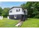 Two-story home featuring a unique raised foundation and inviting front steps at 1036 20Th Ne St, Hickory, NC 28601