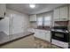 Clean kitchen with ample counter space, essential appliances, and abundant cabinet storage at 1036 20Th Ne St, Hickory, NC 28601