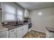 Functional kitchen with practical layout and essential appliances and neutral countertops at 1036 20Th Ne St, Hickory, NC 28601