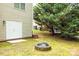 The backyard features a fire pit for outdoor relaxation and entertaining at 11139 Tradition View Dr, Charlotte, NC 28269