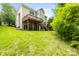 Beautiful backyard with multi-level deck and lush green lawn at 11139 Tradition View Dr, Charlotte, NC 28269