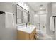 Bathroom with a modern vanity, updated fixtures, and a glass-enclosed shower for a spa-like feel at 11139 Tradition View Dr, Charlotte, NC 28269