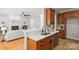 Open-concept kitchen and living room boasts modern finishes and hardwood floors at 11139 Tradition View Dr, Charlotte, NC 28269