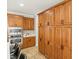 Kitchen features stainless appliances and ample wood cabinet storage for optimal organization at 11139 Tradition View Dr, Charlotte, NC 28269