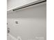 Bright laundry room features hookups and clean, neutral walls at 11139 Tradition View Dr, Charlotte, NC 28269