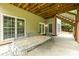 The patio features an outdoor dining area with a metal table and view to the backyard at 11139 Tradition View Dr, Charlotte, NC 28269
