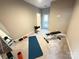 Bright home gym featuring carpeted floors, and access to the outdoors at 114 Mint Ave # A, Mooresville, NC 28117
