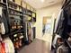Large walk-in closet includes lots of space and a view into the laundry room at 114 Mint Ave # A, Mooresville, NC 28117