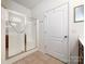 Clean bathroom featuring a glass-enclosed shower and tile flooring at 1228 Tranquil Falls Ln, Matthews, NC 28104