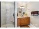 Renovated bathroom showcasing a tiled walk-in shower, vanity, and modern fixtures at 1302 Warrington Pl, Rock Hill, SC 29732
