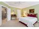 Comfortable bedroom featuring carpet, ample natural light, and neutral walls at 1302 Warrington Pl, Rock Hill, SC 29732