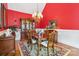 Classic dining room with chandelier, hardwood floors, and elegant furnishings at 1302 Warrington Pl, Rock Hill, SC 29732