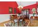 Formal dining room featuring a chandelier, hardwood floors, and classic decor at 1302 Warrington Pl, Rock Hill, SC 29732
