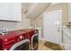 Laundry room features modern washer and dryer at 1302 Warrington Pl, Rock Hill, SC 29732