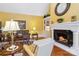Inviting living room showcasing a fireplace, hardwood floors, and a stylish seating arrangement at 1302 Warrington Pl, Rock Hill, SC 29732