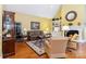 Inviting living room with fireplace, built-ins, and comfortable seating at 1302 Warrington Pl, Rock Hill, SC 29732
