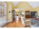 Spacious living room with hardwood floors and tall ceiling, offering a comfortable setting at 1302 Warrington Pl, Rock Hill, SC 29732