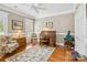 Bright office with hardwood floors, natural light, and traditional furnishings at 1302 Warrington Pl, Rock Hill, SC 29732