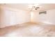 Large bedroom features carpet, closets, ceiling fan and window at 1304 5Th Street Nw Cir, Hickory, NC 28601