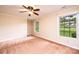 Bedroom featuring carpet, a ceiling fan and natural light at 1304 5Th Street Nw Cir, Hickory, NC 28601