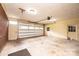 Garage space with overhead door, side door, and ample space for vehicles at 1304 5Th Street Nw Cir, Hickory, NC 28601