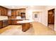 Spacious kitchen featuring tile flooring, breakfast bar, and stainless steel appliances at 1304 5Th Street Nw Cir, Hickory, NC 28601