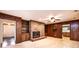 Cozy living room with brick fireplace, built-in shelving and hardwood-style walls at 1304 5Th Street Nw Cir, Hickory, NC 28601