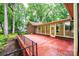 Enclosed back patio with full view of back yard and privacy from the trees at 1304 5Th Street Nw Cir, Hickory, NC 28601