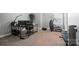 Office space featuring a black desk with dual monitors, an exercise machine, and a weight bench at 16229 Loch Raven Rd, Huntersville, NC 28078