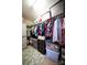 Walk-in closet, equipped with shelving and plenty of space for organized storage at 16525 Kettlewell Ln, Charlotte, NC 28277