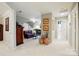 Bonus room featuring a cozy seating area and open hallway with decorative vases at 1720 Mountain Park Dr, Charlotte, NC 28214