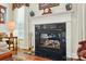 Elegant fireplace with marble surround and decorative mantel accents at 1720 Mountain Park Dr, Charlotte, NC 28214