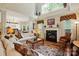 Bright living room with high ceilings, fireplace, and an open floor plan at 1720 Mountain Park Dr, Charlotte, NC 28214