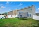 Spacious backyard featuring a play set, trampoline, and manicured lawn at 2013 Eastway Dr, Dallas, NC 28034