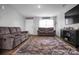 Spacious living room with plush sofas, a decorative rug, and a television at 2013 Eastway Dr, Dallas, NC 28034
