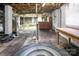 Unfinished basement space featuring utilities, exposed brick, and a window for natural light at 2108 Twin Ave, Gastonia, NC 28052