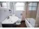 This bathroom has a single bowl sink in a vanity, a toilet, and a shower with glass doors at 2108 Twin Ave, Gastonia, NC 28052
