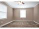 This cozy bedroom has neutral paint, clean white trim, and good light from the double windows at 2108 Twin Ave, Gastonia, NC 28052