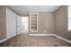 This bedroom has a closet, an open shelving area, neutral paint, and white trim at 2108 Twin Ave, Gastonia, NC 28052