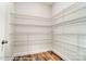 Spacious walk-in pantry with white wire shelving for optimal storage and organization at 2227 Caravan Ln # 43, Denver, NC 28164