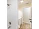 Bathroom boasts white tile, modern fixtures, and a tub/shower combination at 2280 Cannon Farm Rd, China Grove, NC 28023