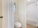 Bathroom boasts white tile, modern fixtures, and a tub/shower combination at 2280 Cannon Farm Rd, China Grove, NC 28023