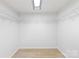 Large walk-in closet with plenty of storage space and bright overhead lighting at 2280 Cannon Farm Rd, China Grove, NC 28023