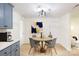 Bright dining area featuring a round table with seating for four and modern decor at 2280 Cannon Farm Rd, China Grove, NC 28023