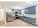Modern kitchen featuring stainless steel appliances, custom cabinetry, and quartz countertops at 2280 Cannon Farm Rd, China Grove, NC 28023
